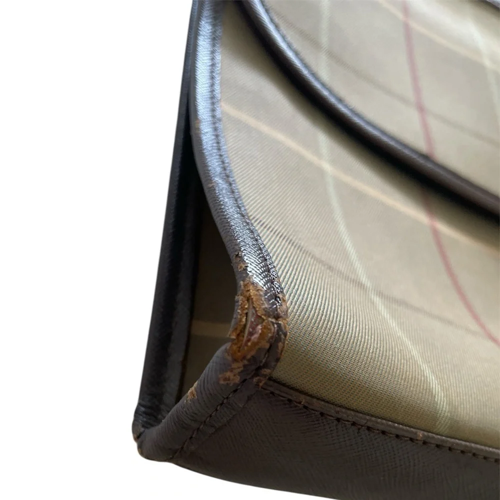 Burberry’s Vintage Beige Canvas Clutch Bag